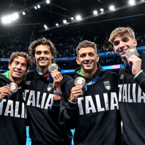 Manuel Frigo, Thomas Ceccon, Paolo Conte Bonin and Alessandro Miressi of Italy show the bronze medals after competing in the swimming 4x100m Freestyle Relay Men Final during the Paris 2024 Olympic Games at La Defense Arena in Paris (France), July 27, 2024.