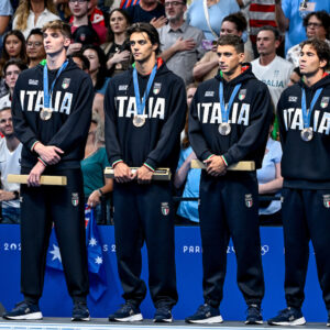 Alessandro Miressi, Thomas Ceccon, Paolo Conte Bonin and Manuel Frigo of Italy stand with the bronze medal after competing in the swimming 4x100m Freestyle Relay Men Final during the Paris 2024 Olympic Games at La Defense Arena in Paris (France), July 27, 2024.
