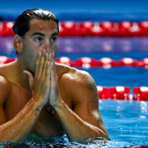 Manuel Frigo of Italy celebrates after winning the silver medal in the swimming 4x100m Freestyle Relay Men Final during the 22nd World Aquatics Championships at the WAC Arena in Singapore (Singapore), July 27, 2025.