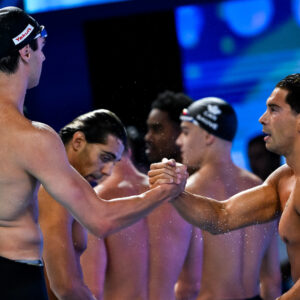 Lorenzo Zazzeri, Manuel Frigo of Italy celebrate after winning the silver medal in the swimming 4x100m Freestyle Relay Men Final during the 22nd World Aquatics Championships at the WAC Arena in Singapore (Singapore), July 27, 2025.