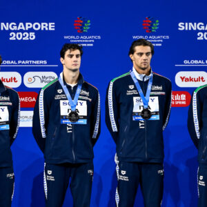 Manuel Frigo, Lorenzo Zazzeri, Thomas Ceccon, Carlos D’Ambrosio of Italy stand with the silver medal after competing in the swimming 4x100m Freestyle Relay Men Final during the 22nd World Aquatics Championships at the WAC Arena in Singapore (Singapore), July 27, 2025.